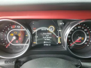 2021 Jeep Wrangler Unlimited Rubicon z VIN 1C4HJXFN1MW793064, wystawiony jako Copart lot #55643305 z przebiegiem 51 944 mil mil oraz Szkoda całkowita • Salvage title. Historia ofert i sprzedaży dostępna na DreamBid. Obrazek 9.
