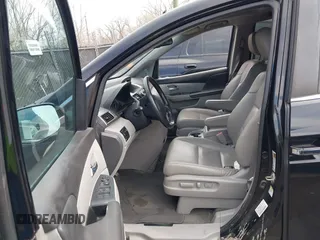 2016 Honda Odyssey EX-L with VIN 5FNRL5H68GB150485, listed as a IAAI auction lot 41835927 with 97,765 mi miles. Bid and sale history available at carsss.com. Image 5.