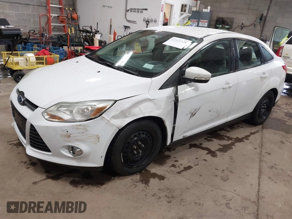 2012 Ford Focus SE с VIN 1FAHP3F21CL301085, выставлен на аукционе IAAI как лот 42321328 с пробегом 157 818 миль миль и . История ставок и продаж доступна на DreamBid. Изображение 2.