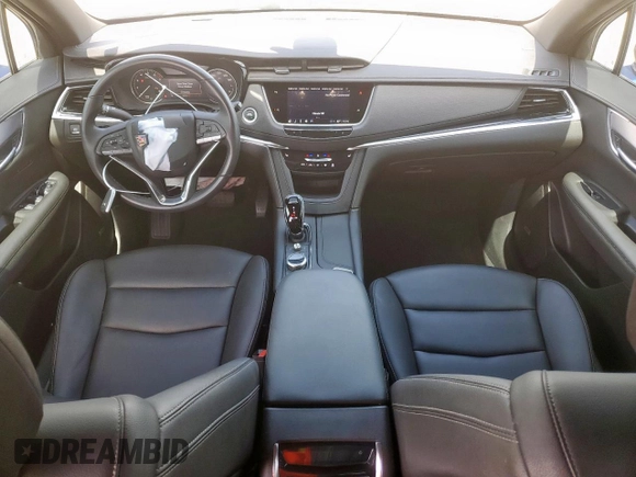 2023 Cadillac XT6 FWD Luxury с VIN 1GYKPAR42PZ167668, выставлен на аукционе Copart как лот 62093575 с пробегом 32 212 миль миль и Списание • Salvage title. История ставок и продаж доступна на DreamBid. Изображение 8.