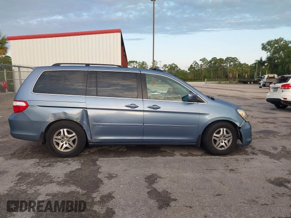 2007 Honda Odyssey EX-L z VIN 5FNRL38717B035384, wystawiony jako IAAI lot #41976861 z przebiegiem 211 640 mil mil oraz . Historia ofert i sprzedaży dostępna na DreamBid. Obrazek 13.