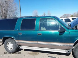 1997 Chevrolet Suburban with VIN 3GNFK16R9VG184722, listed as a IAAI auction lot 41662635 with 176,652 mi miles. Bid and sale history available at carsss.com. Image 6.