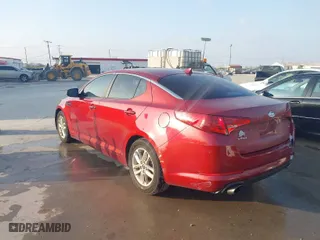 2011 Kia Optima LX with VIN KNAGM4A72B5072570, listed as a IAAI auction lot 41802542 with 188,922 mi miles. Bid and sale history available at carsss.com. Image 3.