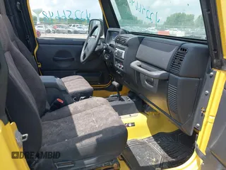 2004 Jeep Wrangler Sport z VIN 1J4FA49S04P701986, wystawiony jako IAAI lot #42256648 z przebiegiem 129 946 mil mil oraz . Historia ofert i sprzedaży dostępna na DreamBid. Obrazek 5.