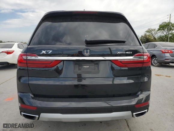 2022 BMW X7 xDrive40i with VIN 5UXCW2C05N9N00658, listed as a Copart auction lot 52007945 with 23,690 mi miles and Salvage Title. Bid and sale history available at carsss.com. Image 6.