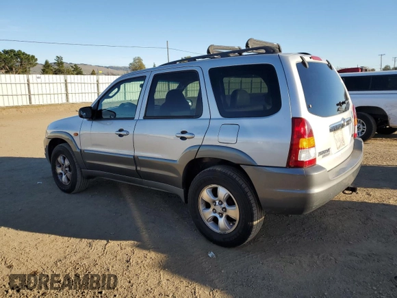 2001 Mazda Tribute LX with VIN 4F2CU08111KM20113, listed as a Copart auction lot 87681195 with 144,400 mi miles and Salvage Title. Bid and sale history available at DreamBid. Image 2.