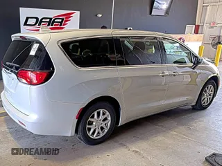 2017 Chrysler Pacifica Touring with VIN 2C4RC1DG5HR764942, listed as a IAAI auction lot 42255421 with 64,381 mi miles and . Bid and sale history available at DreamBid. Image 23.