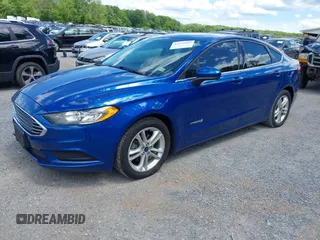 2018 Ford Fusion SE z VIN 3FA6P0LU9JR171096, wystawiony jako IAAI lot #42329683 z przebiegiem 126 463 mil mil oraz . Historia ofert i sprzedaży dostępna na DreamBid. Obrazek 18.