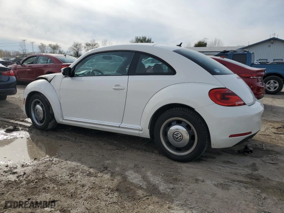 2012 Volkswagen Beetle 2.5L PZEV with VIN 3VWJP7AT6CM605642, listed as a Copart auction lot 80018214 with 101,694 mi miles and Salvage Title. Bid and sale history available at carsss.com. Image 2.