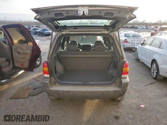 2002 Ford Escape XLS Choice with VIN 1FMYU01162KC61229, listed as a Copart auction lot 41985085 with 74,203 mi miles and Salvage title. Bid and sale history available at DreamBid. Image 6.