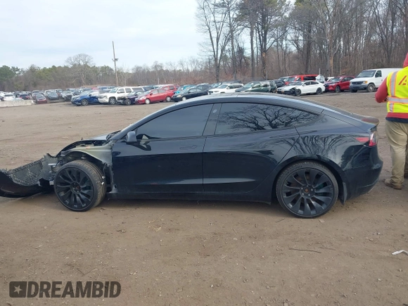2023 Tesla Model 3 Long Range with VIN 5YJ3E1EB6PF673532, listed as a IAAI auction lot 41885716 with 39,690 mi miles and . Bid and sale history available at DreamBid. Image 14.