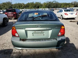 2005 Hyundai Accent GLS with VIN KMHCG35C75U328380, listed as a Copart auction lot 74935354 with 4,848 mi miles and Salvage Title. Bid and sale history available at carsss.com. Image 6.