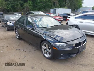 2014 BMW 3 Series 328i xDrive with VIN WBA3B5C54EF958961, listed as a IAAI auction lot 42542378 with 310,348 mi miles and . Bid and sale history available at DreamBid. Image 1.