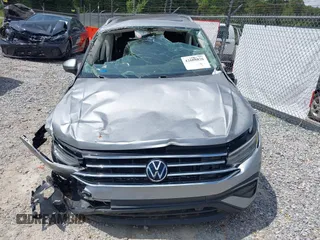 2022 Volkswagen Tiguan SE z VIN 3VV3B7AXXNM167936, wystawiony jako IAAI lot #42608826 z przebiegiem Nie podano mil oraz . Historia ofert i sprzedaży dostępna na DreamBid. Obrazek 11.