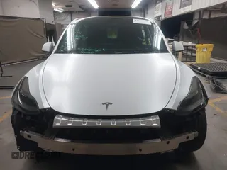 2023 Tesla Model Y Performance with VIN 7SAYGDEF5PF665560, listed as a IAAI auction lot 41809349 with Not Provided miles and . Bid and sale history available at DreamBid. Image 13.
