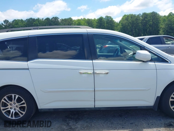 2011 Honda Odyssey EX-L with VIN 5FNRL5H6XBB002461, listed as a IAAI auction lot 42662720 with 145,672 mi miles and . Bid and sale history available at DreamBid. Image 13.