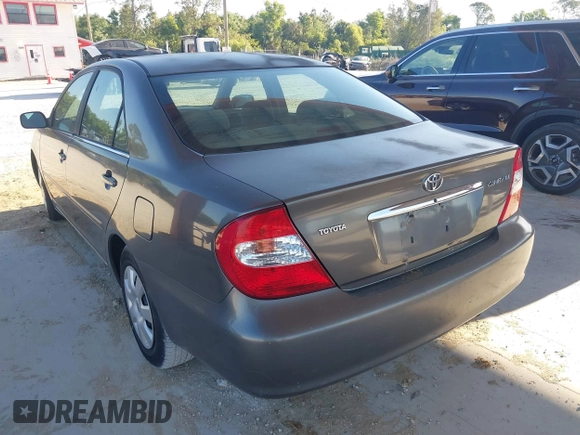2004 Toyota Camry LE with VIN 4T1BE32KX4U916477, listed as a IAAI auction lot 42018299 with 149,247 mi miles. Bid and sale history available at carsss.com. Image 3.