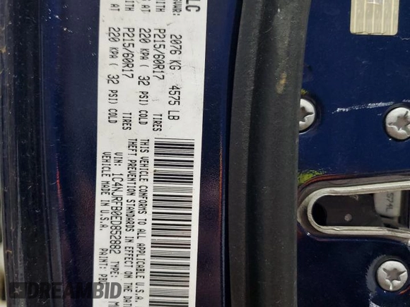 2014 Jeep Patriot Latitude with VIN 1C4NJRFB0ED852882, listed as a Copart auction lot 49674915 with 130,367 mi miles and Salvage title. Bid and sale history available at DreamBid. Image 13.