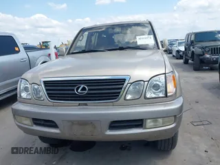 2001 Lexus LX 470 with VIN JTJHT00W713511796, listed as a IAAI auction lot 42222574 with 297,427 mi miles and . Bid and sale history available at carsss.com. Image 12.