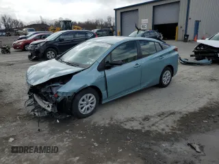 2021 Toyota Prius L Eco with VIN JTDKAMFU0M3134583, listed as a Copart auction lot 52434195 with 26,018 mi miles and Salvage Title. Bid and sale history available at carsss.com. Image 1.