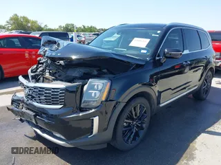 2020 Kia Telluride SX with VIN 5XYP54HC8LG075209, listed as a IAAI auction lot 42000202 with 107,590 mi miles and . Bid and sale history available at DreamBid. Image 2.