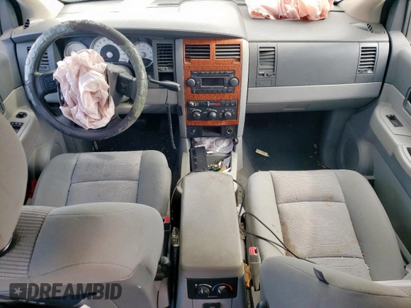 2007 Dodge Durango SLT z VIN 1D8HD48P87F581689, wystawiony jako Copart lot #54937005 z przebiegiem Nie podano mil oraz Szkoda całkowita • Salvage title. Historia ofert i sprzedaży dostępna na DreamBid. Obrazek 8.