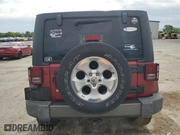 2013 Jeep Wrangler Unlimited Freedom z VIN 1C4BJWDG7DL582764, wystawiony jako Copart lot #54133275 z przebiegiem 183 507 mil mil oraz Szkoda całkowita • Salvage title. Historia ofert i sprzedaży dostępna na DreamBid. Obrazek 6.