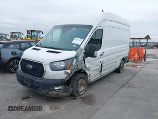 2021 Ford Transit Cargo with VIN 1FTBR1X82MKA98734, listed as a IAAI auction lot 41424123 with 84,453 mi miles and . Bid and sale history available at DreamBid. Image 17.