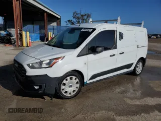 2020 Ford Transit Connect XL with VIN NM0LS7E74L1438053, listed as a Copart auction lot 77137214 with 100,650 mi miles and Salvage title. Bid and sale history available at DreamBid. Image 1.
