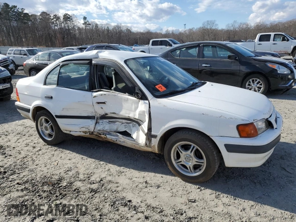 1997 Toyota Tercel DX z VIN JT2BC52L5V0215622, wystawiony jako Copart lot #87475544 z przebiegiem 382 242 mil mil oraz Szkoda całkowita • Salvage title. Historia ofert i sprzedaży dostępna na DreamBid. Obrazek 4.