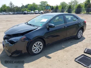 2018 Toyota Corolla L with VIN 2T1BURHE6JC041032, listed as a IAAI auction lot 42387981 with 48,094 mi miles and . Bid and sale history available at DreamBid. Image 17.