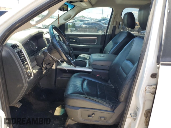 2015 Ram 1500 Lone Star with VIN 1C6RR7LT5FS769464, listed as a Copart auction lot 58975365 with 124,551 mi miles and Salvage title. Bid and sale history available at DreamBid. Image 7.