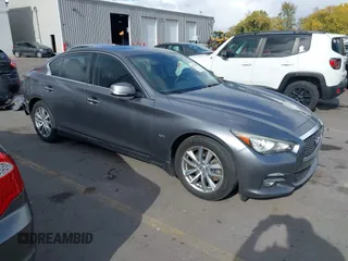 2017 Infiniti Q50 Premium with VIN JN1EV7AR2HM830032, listed as a IAAI auction lot 40777161 with 104,834 mi miles and . Bid and sale history available at DreamBid. Image 1.