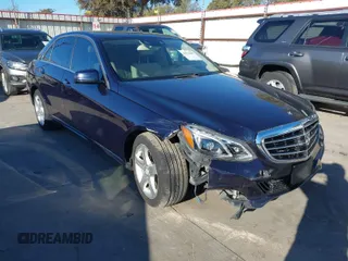 2014 Mercedes-Benz E-Class E 350 Luxury with VIN WDDHF8JBXEB068470, listed as a IAAI auction lot 40914692 with 96,308 mi miles. Bid and sale history available at carsss.com. Image 1.
