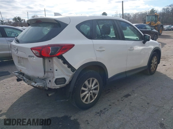 2013 Mazda CX-5 Sport with VIN JM3KE4BE5D0165212, listed as a IAAI auction lot 41332056 with 150,301 mi miles. Bid and sale history available at carsss.com. Image 4.