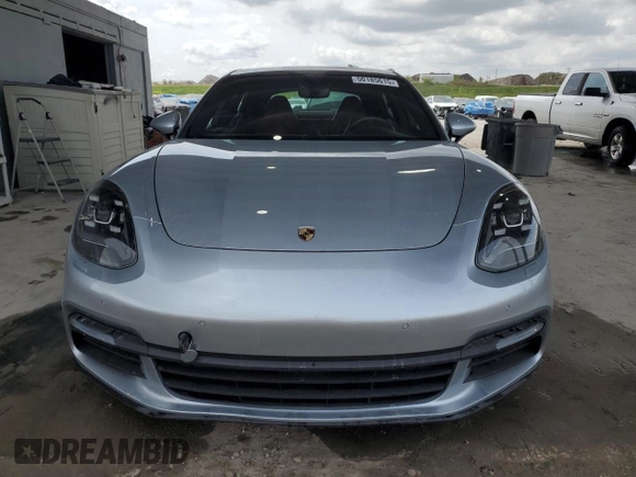 2018 Porsche Panamera z VIN WP0AA2A77JL102517, wystawiony jako Copart lot #52569245 z przebiegiem 64 314 mil mil oraz Czysty tytuł • Clean title. Historia ofert i sprzedaży dostępna na DreamBid. Obrazek 5.