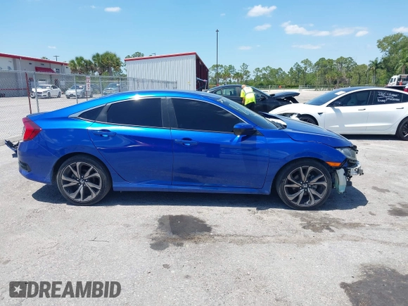 2021 Honda Civic Sport with VIN 2HGFC2F80MH527517, listed as a IAAI auction lot 42020871 with 36,058 mi miles and . Bid and sale history available at DreamBid. Image 14.