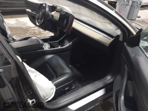 2018 Tesla Model 3 Long Range Battery with VIN 5YJ3E1EB7JF086778, listed as a IAAI auction lot 41348008 with 74,491 mi miles and . Bid and sale history available at DreamBid. Image 5.