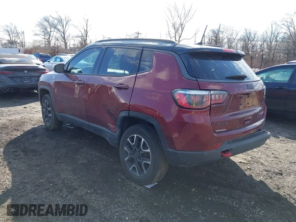 2020 Jeep Compass Trailhawk with VIN 3C4NJDDB2LT239384, listed as a IAAI auction lot 41527372 with 56,122 mi miles and . Bid and sale history available at carsss.com. Image 3.