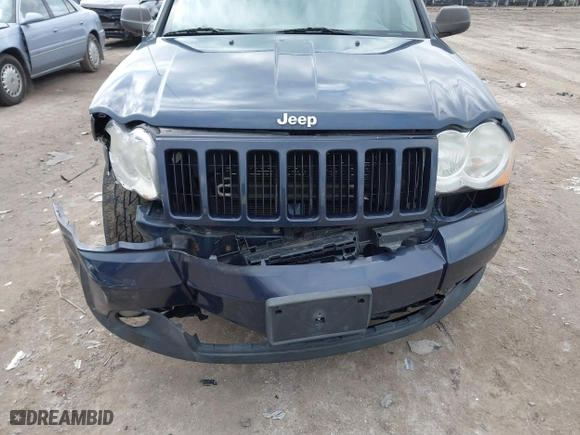 2010 Jeep Grand Cherokee Laredo with VIN 1J4PR4GK5AC138498, listed as a IAAI auction lot 41870740 with 130,551 mi miles. Bid and sale history available at carsss.com. Image 6.