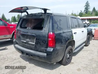 2019 Chevrolet Tahoe Commercial with VIN 1GNLCDEC3KR323012, listed as a IAAI auction lot 42517025 with 40,412 mi miles and . Bid and sale history available at DreamBid. Image 4.