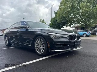 2017 BMW 7 Series 740i with VIN WBA7E2C32HG741395, listed as a Copart auction lot 56335195 with 133,818 mi miles and Clean Title. Bid and sale history available at DreamBid. Image 1.
