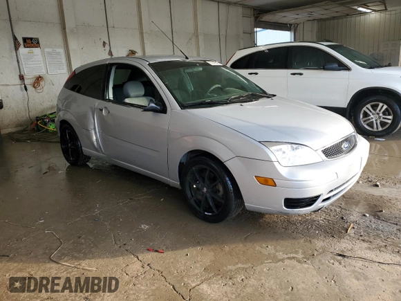 2007 Ford Focus S with VIN 1FAFP31N47W129857, listed as a Copart auction lot 51449645 with 146,360 mi miles and Salvage Title. Bid and sale history available at DreamBid. Image 4.