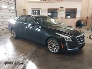 2014 Cadillac CTS Luxury AWD with VIN 1G6AX5SX3E0125804, listed as a IAAI auction lot 41523158 with 149,240 mi miles and . Bid and sale history available at carsss.com. Image 1.