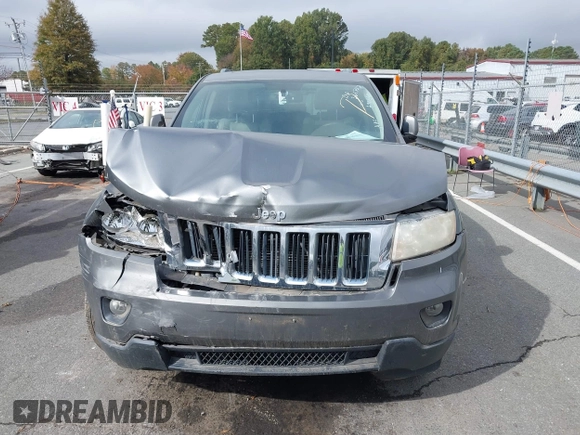 2012 Jeep Grand Cherokee Laredo with VIN 1C4RJFAG8CC298268, listed as a IAAI auction lot 40787833 with 206,486 mi miles. Bid and sale history available at carsss.com. Image 11.