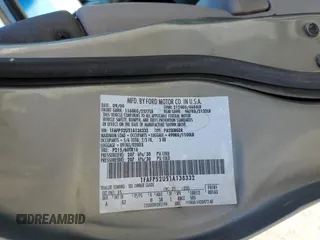 2001 Ford Taurus LX Standard z VIN 1FAFP52U51A138332, wystawiony jako Copart lot #88528355 z przebiegiem 166 511 mil mil oraz Szkoda całkowita • Salvage title. Historia ofert i sprzedaży dostępna na DreamBid. Obrazek 12.