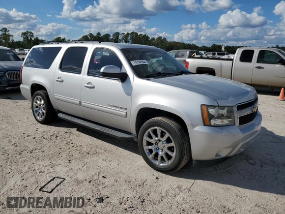 2011 Chevrolet Suburban LS with VIN 1GNSCHE08BR238949, listed as a Copart auction lot 74702004 with 147,451 mi miles and Salvage Title. Bid and sale history available at carsss.com. Image 4.