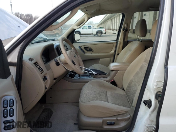 2005 Ford Escape XLT with VIN 1FMYU03135KA93616, listed as a Copart auction lot 50364865 with 210,884 mi miles and Salvage Title. Bid and sale history available at DreamBid. Image 7.
