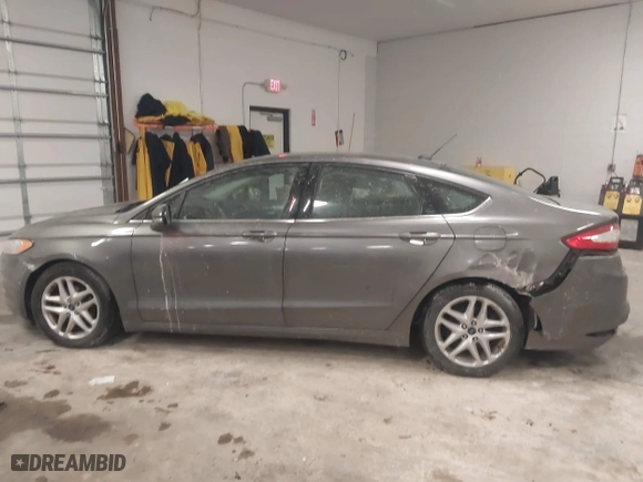 2014 Ford Fusion SE with VIN 1FA6P0H73E5389384, listed as a IAAI auction lot 41387809 with 164,490 mi miles. Bid and sale history available at carsss.com. Image 14.