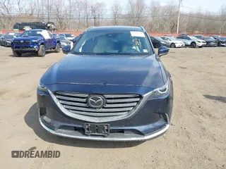 2021 Mazda CX-9 Grand Touring with VIN JM3TCBDY7M0540359, listed as a IAAI auction lot 41711366 with 47,391 mi miles and . Bid and sale history available at carsss.com. Image 12.
